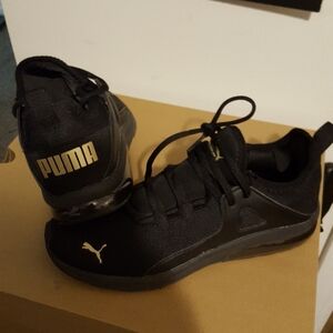 Like New Puma Black and Gold Women's Sneakers